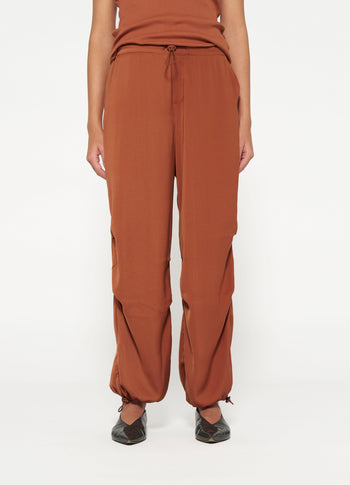 satin parachute pants | saddle brown