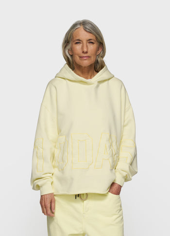 statement logo hoodie | pastel yellow