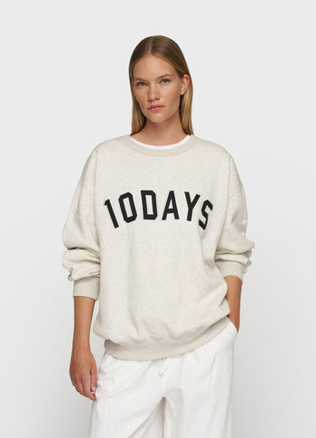 THE STATEMENT SWEATER | soft white melee