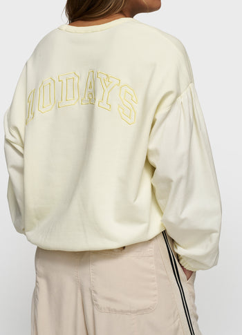 puffed sleeve sweater | faded pastel yellow