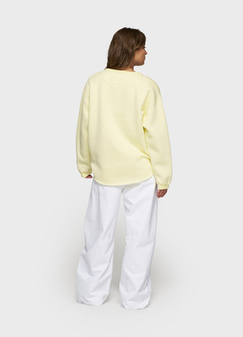 raw edge sweater | pastel yellow