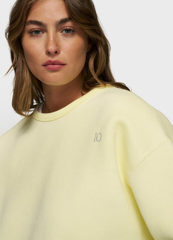 raw edge sweater | pastel yellow