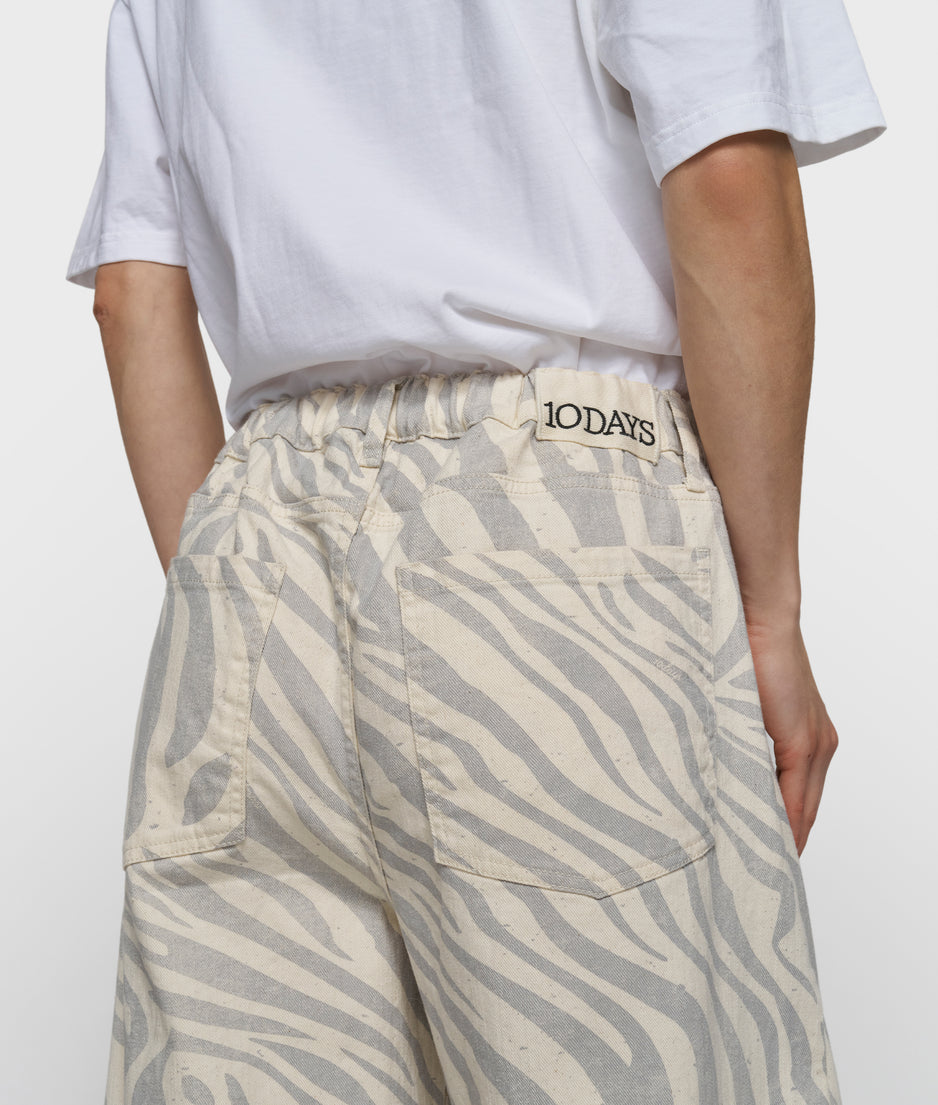 Western Hose mit Zebraprint | ecru
