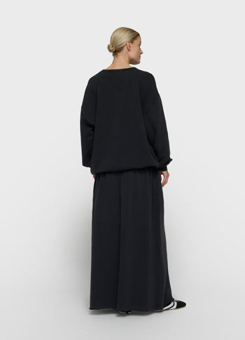 statement sweater believe | dark charcoal