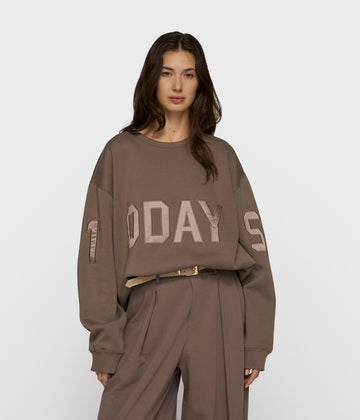 statement sweater logo | moonrock