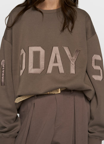 statement sweater logo | moonrock