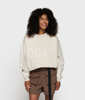 statement sweater logo patch | soft white melee