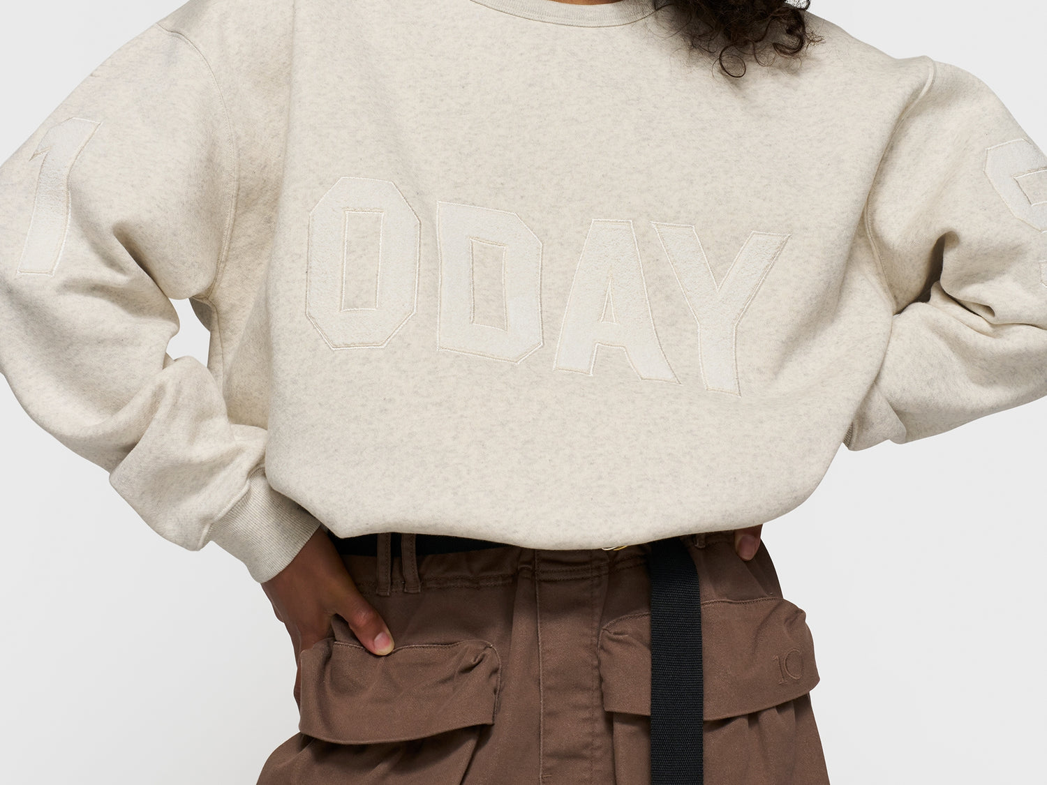 statement sweater logo patch | soft white melee