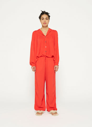 flowy pleated blouse | poppy red