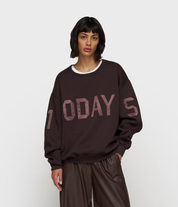 statement sweater logo | deep wine
