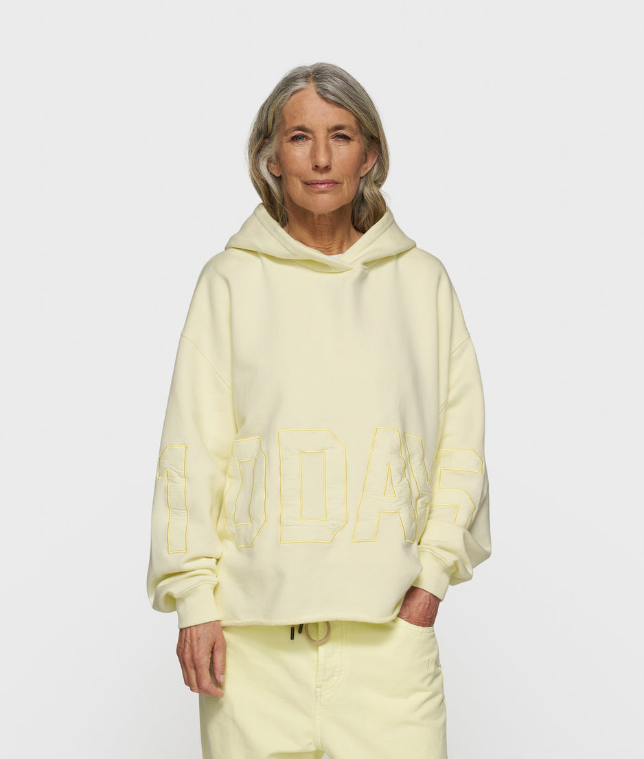 statement logo hoodie | pastel yellow