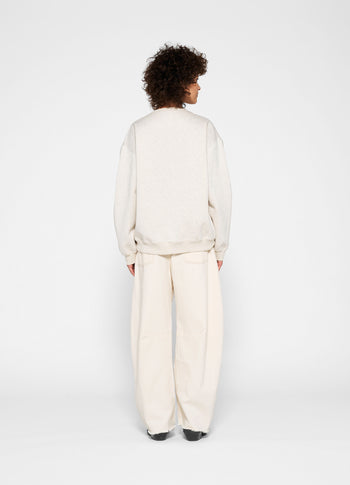 statement sweater logo | soft white melee