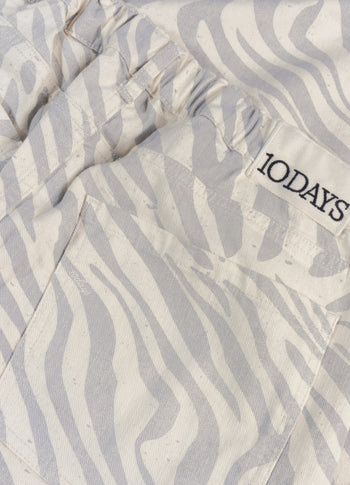 Western Hose mit Zebraprint | ecru
