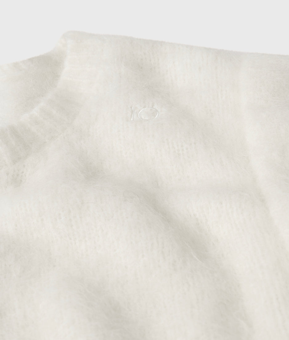 sleeveless knit sweater | ecru