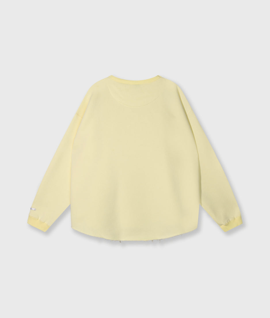 raw edge sweater | pastel yellow