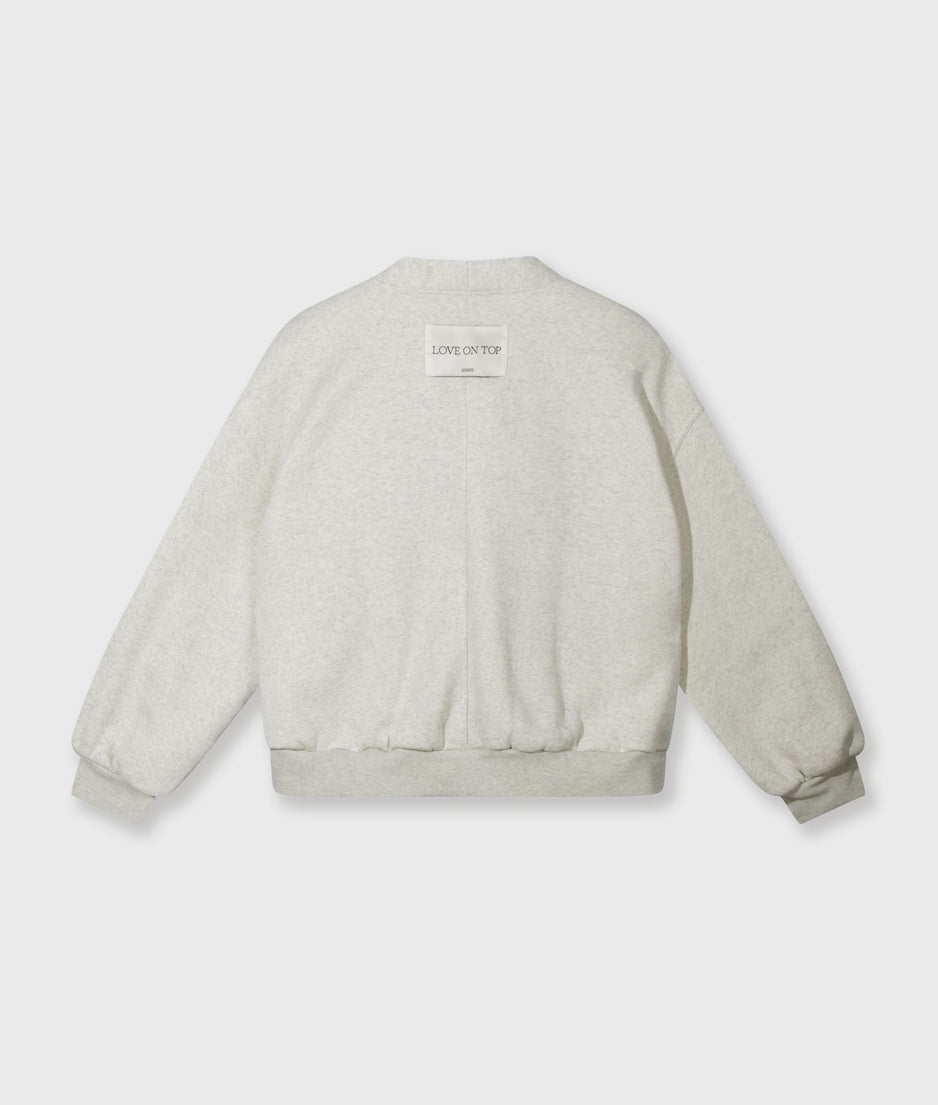 fleece bomber | soft white melee