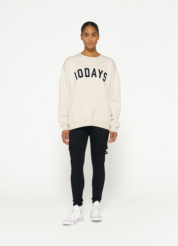 THE STATEMENT SWEATER | soft white melee