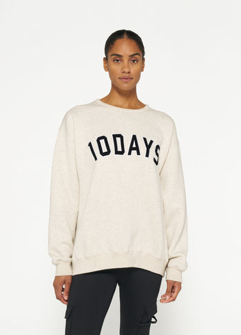 THE STATEMENT SWEATER | soft white melee