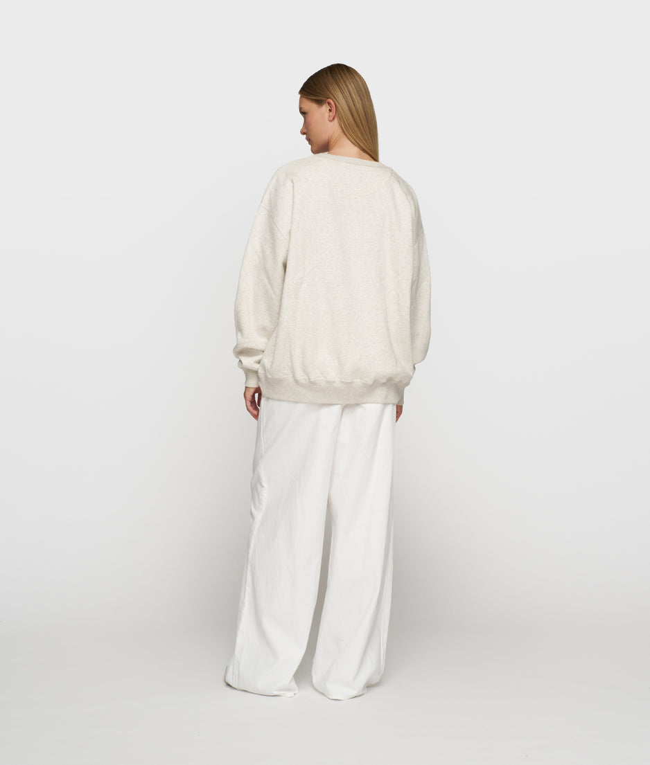 THE STATEMENT SWEATER | soft white melee