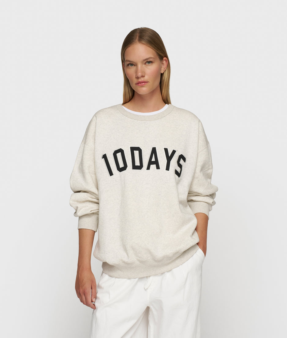 THE STATEMENT SWEATER | soft white melee