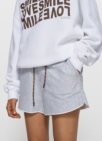 statement sweater smile | white