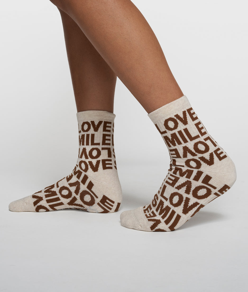 socks all-over smile love | soft white melee