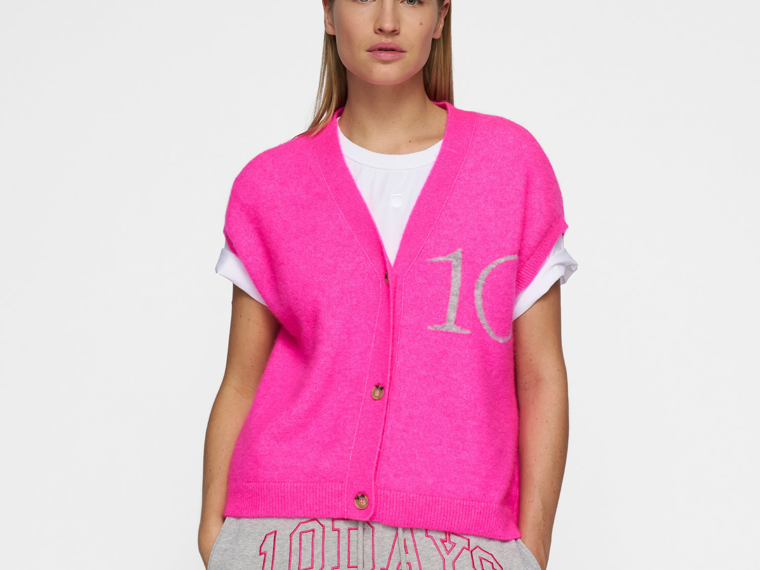 knit gilet | neon pink
