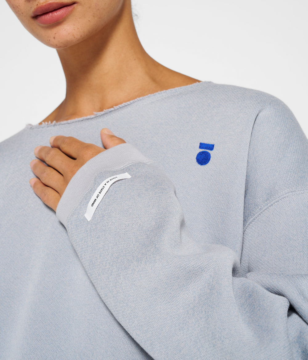 raw edge statement sweater | storm blue