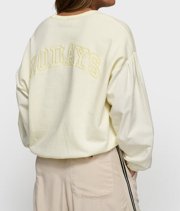 puffed sleeve sweater | faded pastel yellow