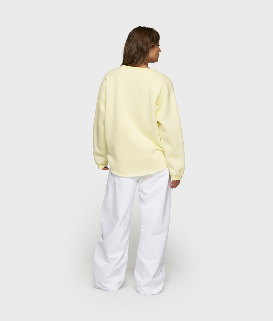 raw edge sweater | pastel yellow