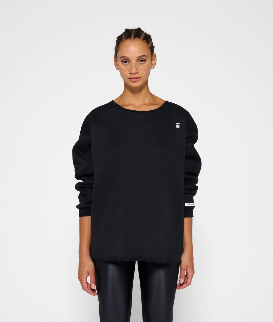 raw edge statement sweater | black